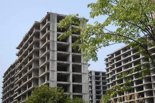 RPT In China, Home Buyers Occupy Their 'rotting', Unfinished Properties